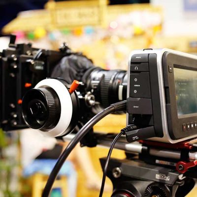 image of a blackmagic cinema camera filming in a brightly lit environment